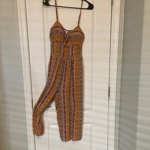 AUW Strappy Printed Jumpsuit in Mustard and Rust